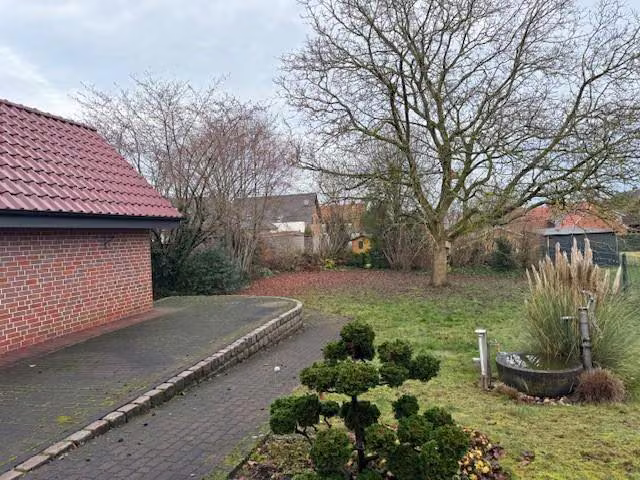 Zwangsversteigerung Doppelhaushälfte in Reken, Maria Veen – Blick in den großzügigen Garten.