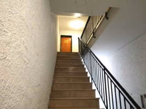 Zwangsversteigerung Eigentumswohnung in Sonthofen – Ansicht der Balkonseite der Wohnung W5.