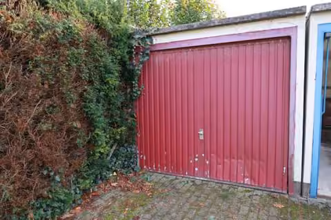Zwangsversteigerung Reihenhaus in Westerstede – Garage auf Flurstück 60/322.