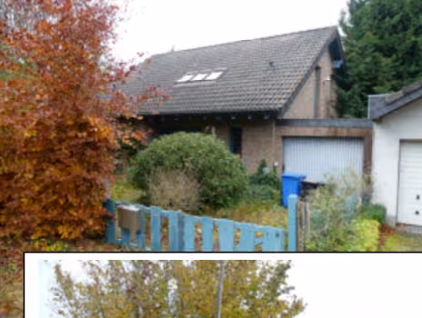 Zwangsversteigerung Einfamilienhaus in Hellenthal, Dickerscheid – Vorderansicht des Einfamilienhauses mit Garage und Vorgarten.