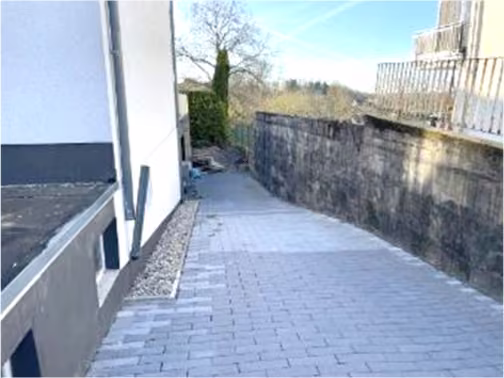 Zwangsversteigerung Eigentumswohnung in Wermelskirchen – Unfertiger Tiefgaragenstellplatz Nr. SP 3 im Rohbauzustand.