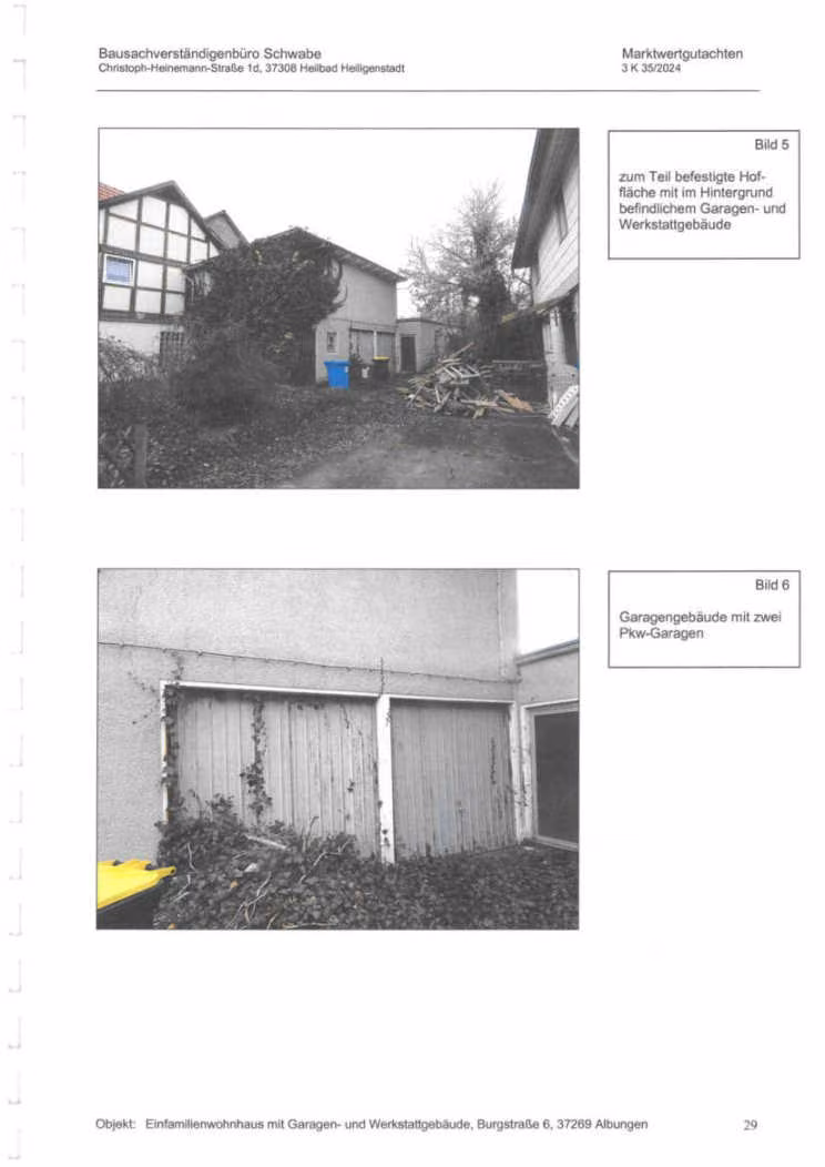 Zwangsversteigerung Zweifamilienhaus in Eschwege, Albungen – Außenansicht des zweigeschossigen Garagengebäudes mit zwei Toren.