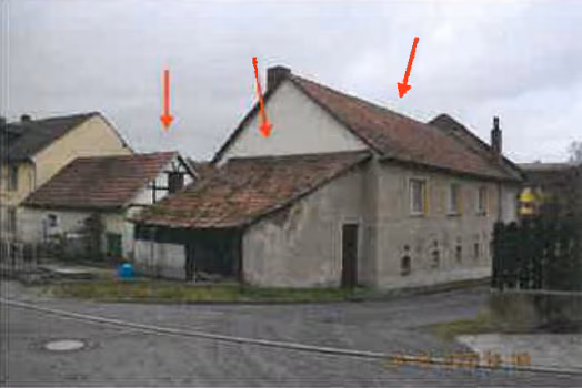 Zwangsversteigerung Wohn-/Geschäftshaus in Schleiz, Crispendorf – Rückwärtige Ansicht von Seitenflügel mit Schleppdachanbau und Hühnerhaus.