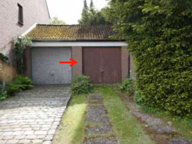 Zwangsversteigerung Doppelhaushälfte in Bremen, Lesum – Rückwärtige Terrassenseite mit darüberliegendem Balkon.