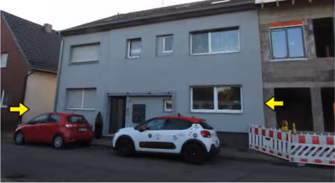 Zwangsversteigerung Mehrfamilienhaus in Düren, Merken – Straßenansicht des Mehrfamilienhauses