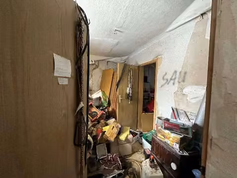 Zwangsversteigerung Einfamilienhaus in Jerichow, Kleinwulkow – Ansicht des rückwärtigen eingeschossigen Gebäudeteils mit Eingangsbereich.