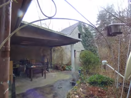 Zwangsversteigerung Einfamilienhaus in Schipkau, Klettwitz – Straßenansicht des Garagennebengebäudes auf Flurstück 119/1.