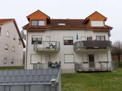 Zwangsversteigerung Eigentumswohnung in Nußloch – Einfahrt zur Tiefgarage der Wohnanlage.
