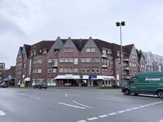 Zwangsversteigerung Eigentumswohnung in Ibbenbüren – Nordostansicht des Wohn- und Geschäftshauses Bahnhofstraße 14 und 16.