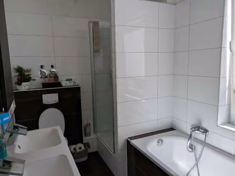 Zwangsversteigerung Zweifamilienhaus in Dortmund, Brackel – Wohnzimmer im Erdgeschoss.