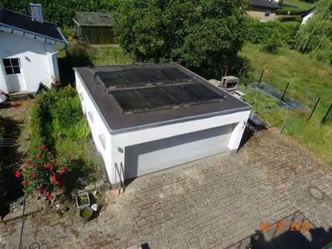 Zwangsversteigerung Eigentumswohnung in Marienheide, Kotthausen – Doppelgarage und Abstellräume zu Wohnung 2