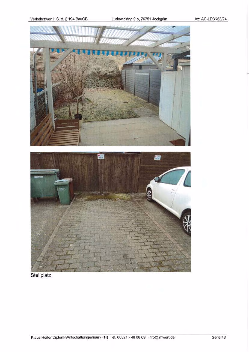 Zwangsversteigerung Reihenhaus in Jockgrim – Gartenbereich und zugeordneter PKW-Stellplatz.