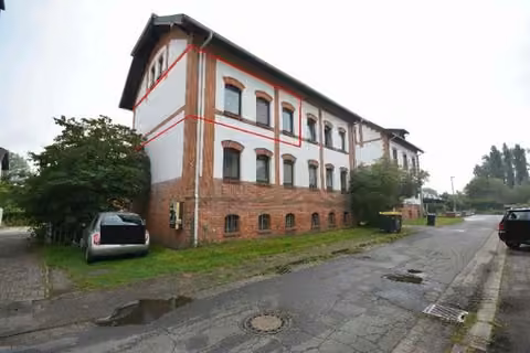 Zwangsversteigerung Eigentumswohnung in Weyhe, Kirchweyhe – Vorderansicht des Mehrfamilienwohnhauses Grundstraße 3.