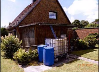 Zwangsversteigerung Einfamilienhaus in Brunsbüttel – Südostfassade des Wohnhauses mit Terrassenbereich
