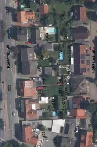 Zwangsversteigerung Doppelhaushälfte in Gronau – Luftbild des Bewertungsobjekts und der umgebenden Bebauung.