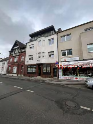 Zwangsversteigerung Büro in Leverkusen, Opladen – Straßenansicht des Vorderhauses an der Lützenkirchener Straße.
