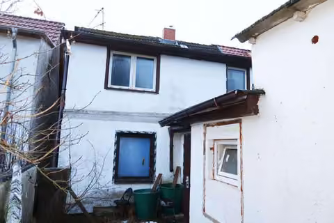 Zwangsversteigerung Einfamilienhaus in Franzburg – Rückansicht des Reihenhauses mit Anbau aus nördlicher Richtung